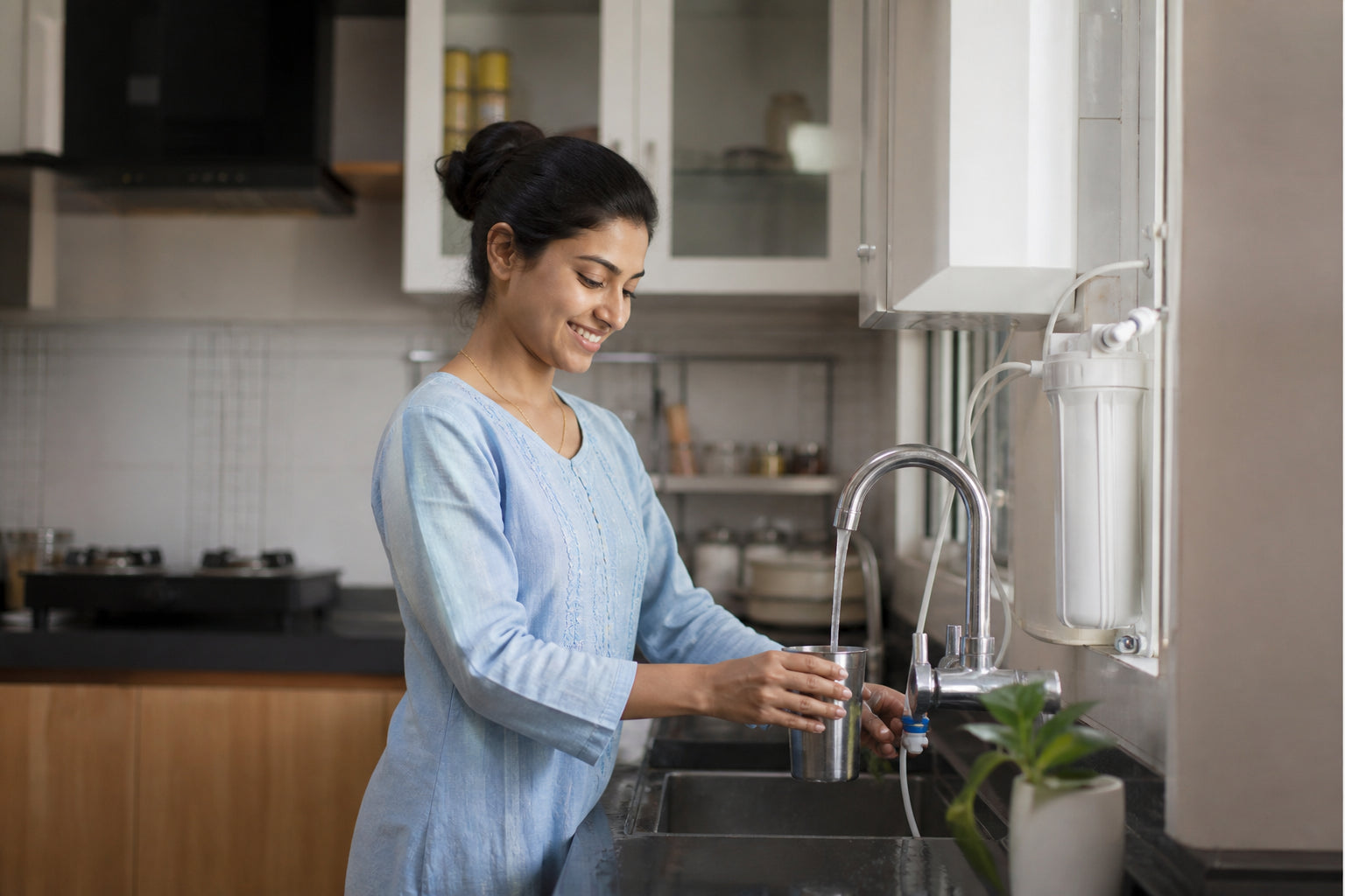 Ms. Avani Nathwani using softened water at home